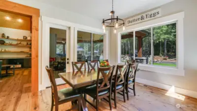 The spacious dining room leads to the covered back patio & is just steps from the kitchen, great for entertaining!