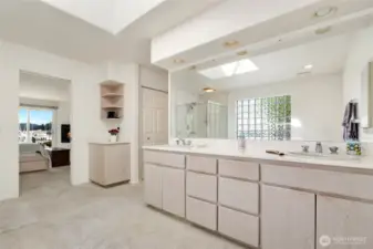 Spacious primary ensuite with plenty of natural light from the skylight, offers a roomy layout.