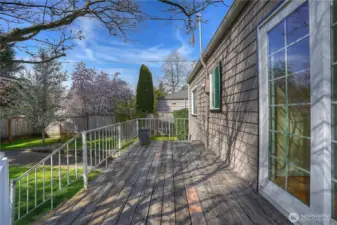 Back on the main level we are graced with a large deck off of the mudroom and kitchen area.  Love to dine outside?  Me, too, and this deck has plenty of space for your grill, seating, and guests.