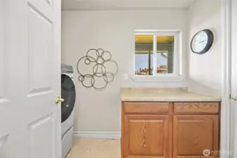 Full size laundry room on main level with windows [one of two laurndry rooms]