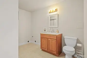 Second laundry w/half bath on lower level