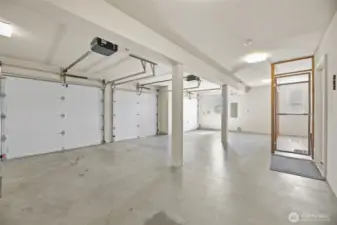 Massive 3 car garage with pet kennel with door for your pets to access the beautiful yard or can be used for secured storage [seller will remove kennel upon request]