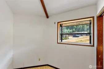 This is a pantry/area off of the kitchen for W/D hookup upstairs
