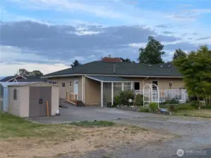 There are two storage sheds included with the sale. It would wise to consider adding a detached additional dwelling unit (DADU) on the north side of the home.  I’d go with a lower level garage with an apartment type unit above it with a rooftop deck.  Check w the city about height maximum & whether they’d permit this use.
