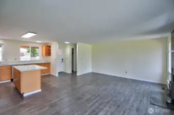 Open floor plan with easy care vinyl plank flooring throughout.