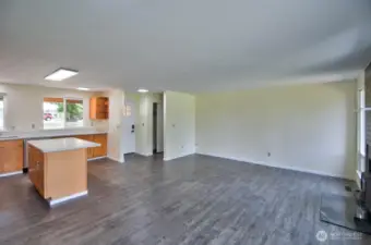 Open floor plan with easy care vinyl plank flooring throughout.