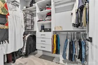 Primary bedroom walk in closet