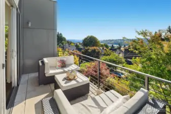 Imagine enjoying your morning coffee as you take in the views. You also have a great view of the urban garden below.