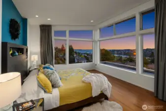 This primary suite is pure decadence. Wake up to some of the best views Seattle has to offer. Custom drapes with electronic controls make it easy to darken the room for sleeping.