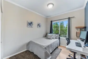 The second bedroom is generously sized, offering ample space to comfortably accommodate both guests and a home office.