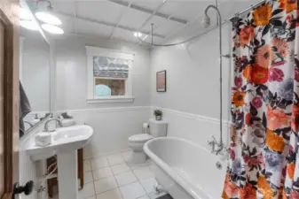 Main floor full bath close to main floor bedroom and office with closet