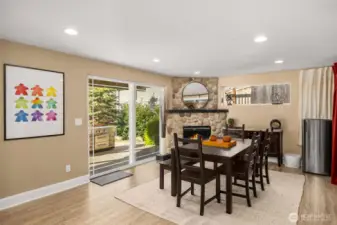 Lower level daylight basement living room with a gas fireplace.
