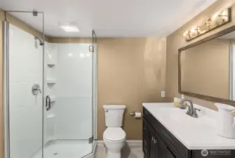 Lower level bath with a shower.