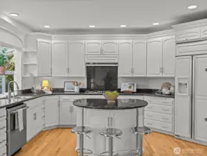 Recently remodeled kitchen with casual eating area and deck access.