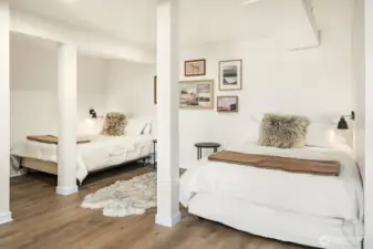 Open bedroom on lower level.