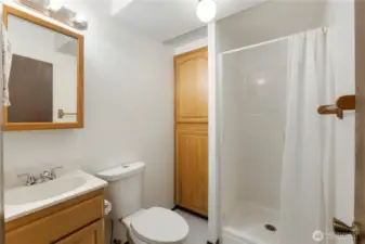 downstairs 3/4 bathroom with extra storage