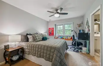 Third bedroom with a window seat shares the Jack N Jill bathroom.