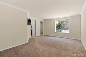 Welcome to the primary suite with its own ensuite bath and walk in closet