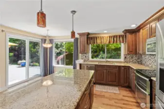 From the island to the eating nook!  Bring the indoor living and outdoor living in