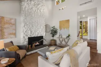 Living Room - Gas Fireplace and Vaulted Ceilings with Additional Windows for Added Sunlight