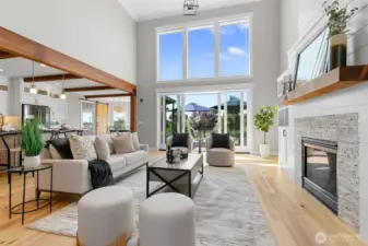 A vast, open floor plan creates the perfect central gathering space for living and casual dining.