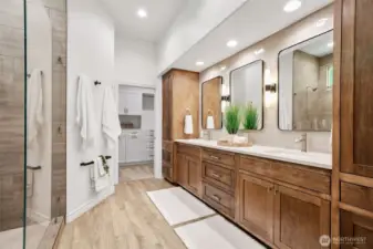 The on-suite primary bath is beautifully appointed with contemporary finishes.
