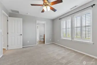 Bedroom 4 leads straight into a 1/bath and walk-in closet, then to a shared shower/bath!