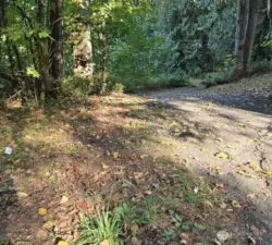 Continue down shared driveway to view property.