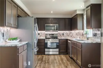 Room for several people helping make dinner