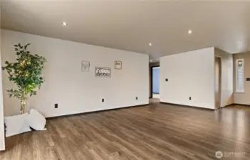 Living room with 3 bedrooms in the distance
