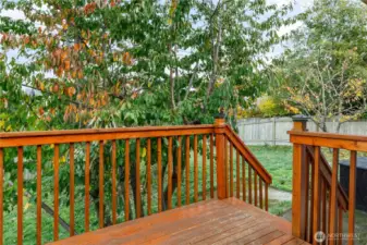 Deck off Sliding glass doors to backyard
