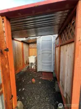 Portable toilet and utility sink.