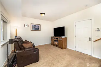 Another view of this versatile space, door leads to the garage.