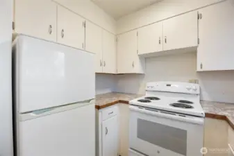 Kitchen with fridge and stove