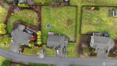 Community field access path to the south of the property