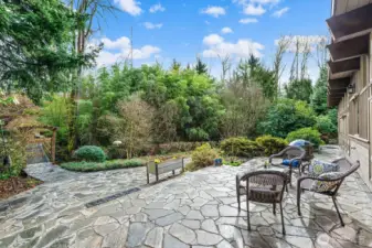 Large private patio ideal for entertaining, outdoor meals, birdwatching, or just sitting to listen to the creek. Another space with endless possibilities!