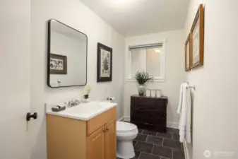 Lower level Powder room with room to add a bathtub/shower.