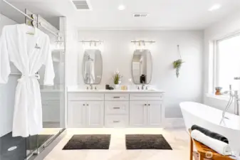 And a separate shower, which is also made up of all one piece solid quartz, with glass shower doors, make this a spa like retreat.