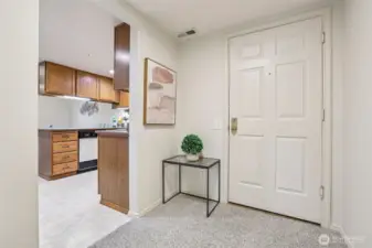 Front entry of condo is wide and welcoming