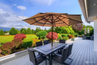 Backyard of the home features great privacy with the low-maintenance landscaping. The deck spans the distance of almost the whole home on the east side. The deck is an early TREX style decking and has held up well over the years. Plenty of room for entertaining!