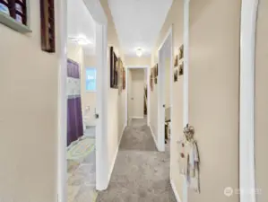 he hallway offers convenient access to the bathroom and both bedrooms, enhancing the home's functionality and flow