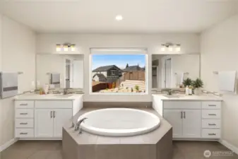This sun splashed bathroom for comfort and convenience, a spa like tub completes your private retreat                                                                                                                                                                                                                                                                    virtually staged