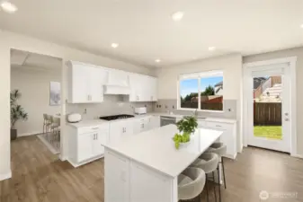 Light and bright, plenty of space for cooks, eager assistants and guests alike.                          virtually staged