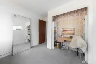 Perhaps a dedicated vanity area or additional storage? The possibilities are yours to explore in this flexible and inviting space.
