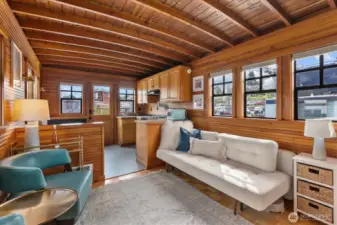 Beautiful barrel ceiling with nice separation between living and dining spaces.