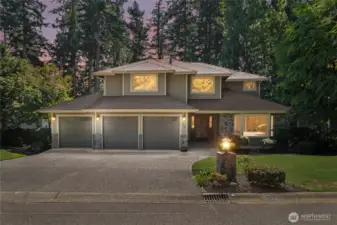 Where modern comfort and scenic beauty come together - backing to trails with views of Lake Wilderness.