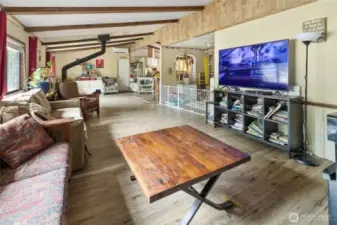 View from corner of great room, showing dining room and extra sitting space.