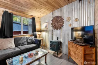 Cast iron gas fireplace heats up the inside nicely.