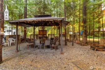 Gazebo with firepit area.