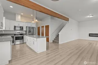 From Dining area looking at both the Kitchen and living area- you'll love how open and bright it is!